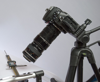 Nikon
D3002 (FlexTT5 Wireless Strobe Trigger and E640
Flash control removed and put on D60 to take this
shot) + PK-13 + all of Extension Ring Set Reversed
Lens Position.