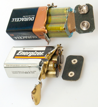Opened Rayovac
                  and Energizer 9V battery showing AAAA cells.