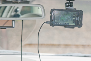 Cell phone sun visor mount