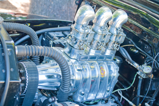 Car
                        Show Santa Rosa 17 June 2012 - Three 2-barrel
                        carbs on super charged flat head Ford