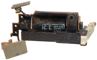 Self Winding Clock
Single Synchronizing coil with Electrical Steel laminations