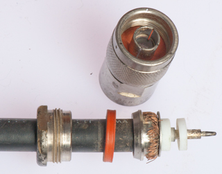 UG-1185 is OK.
The shield wires are intact. Problem was loose nut.